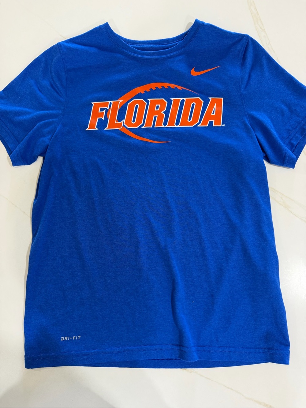 Nike Kids Blue Florida Dri-FIT Tee with Orange Logo